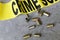 Crime scene close up of crime scene tape and brass bullet casings