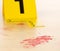 Crime scene investigation CSI evidence marker with blood spot on wood floor background at crime scene - police, evidence or