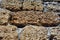 Crimean coquina rock blocks with cement wall close up texture