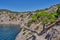 Crimean peninsula. People walk along the tourist route Golitsyn Trail. Botanical reserve New World