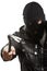 Criminal burglar man in mask holding crowbar