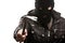 Criminal thief or burglar man in balaclava or mask holding crowbar in hand