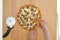 Crimini mushroom pizza with Mozzarella cheese and tomato sauce close up on wooden board, flat lay