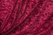 Crimson crushed velvet with soft folds