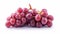 Crimson Delights: An Artistic Display of Red Grapes in Isolation on a White Canvas -