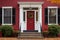crimson front door of a colonial revival house