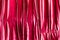 Crimson red curtain as an abstract background