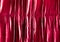 Crimson red curtain as an abstract background