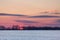 Crimson Sunset over Snowy American Corn Fields in Winter with Bl