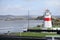 Crinan harbour at canal entrance and lighthouse in Argyll and Bute Scotland