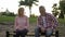 Crisis in relationship, retired man and woman sitting on bench in park, quarrel