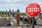 Crisis stop sign with view of Spanish square in Barcelona, Spain. Financial crash in world economy because of coronavirus pandemic