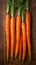 Crisp carrots arranged on a wooden table, farm fresh goodness