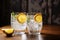 Crisp and cool Glasses holding the classic duo, gin and tonic