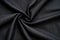 crisp shot of black linen suit fabric