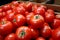 Crisp store drawer showcases an array of farmfresh, juicy tomatoes