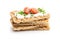 Crispbread with creamy cheese, chive and cherry tomatoes