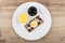 Crispbread with liver pate, egg and olives, mayonnaise in dish