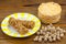 Crispy appetizing bread with strawberries on a plate on  wooden background