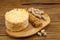 Crispy appetizing bread with strawberries on a plate on  wooden background