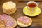 Crispy appetizing bread with strawberries on a plate on  wooden background