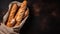 Crispy baguettes in packaging on a dark background, top view