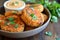 Crispy Breaded Chicken Cutlets Served on a Plate with Creamy Dip and Fresh Parsley Garnish
