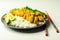 Crispy chicken perked up with an aromatic katsu curry sauce and fragrant fluffy rice