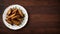 Crispy Chicken Wings on White Plate Wooden Background, Copy Space