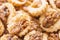 Crispy cookies with walnuts as a background close up. Selective focus