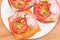 Crispy Cracker Sandwiches with Tomato, Sausage, Cheese, Green Onions and Radish