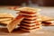 Crispy crackers with jam on wooden table