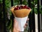 Crispy crepe filled with luscious strawberry whipped cream is a delightful treat that combines the satisfying crunch of the crepe
