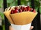 Crispy crepe filled with luscious strawberry whipped cream is a delightful treat that combines the satisfying crunch of the crepe