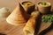 Crispy crepes made of barnyard millets and lentils. Commonly known as barnyard milled ghee roast dosa. Plated in conical shape and