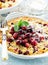 Crispy crumble with cranberry and cherry