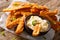 Crispy deep fried baby corn with sauce close-up. horizontal