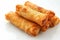 Crispy deep fried spring roll on white background, perfect appetizer