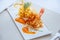 Crispy deep fried tiger prawn with mango salsa and thousand island sauce