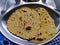 Crispy and delicious Gujarati flatbread- Thepla served on a plate