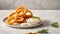 Crispy delicious onion rings prepared food golden lunch portion cuisine fastfood fastfood