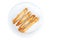 Crispy, freshly baked cheese sticks deep-fried on a white plate. Isolated image. View from above. Eastern cuisine