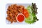 Crispy fried chicken tendon with chili sauce and vegetable dish