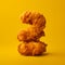 Crispy Fried Chicken On Yellow: A Colorful And Monumental Composition