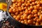 Crispy fried chickpeas with spices macro in a bowl. horizontal