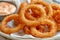 Crispy fried onion rings with dipping sauce