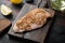 Crispy garlicky chicken raw ingredients on wooden table