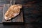 Crispy garlicky chicken raw ingredients on wooden table  with copy space