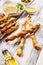 Crispy grissini breadsticks. Traditional Italian wheat bread with garlic, cheese and sesame seeds. Food still life