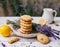 Crispy, homemade cookies with lavender and lemon peel, on a white wooden table